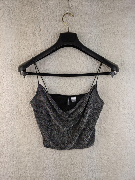 Front view of the H&M Divided sparkly black cropped top