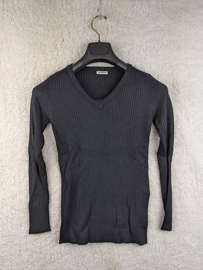 Black ribbed knit sweater on hanger