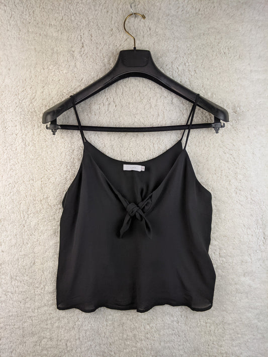 Front view of black Lush cami top with tie front