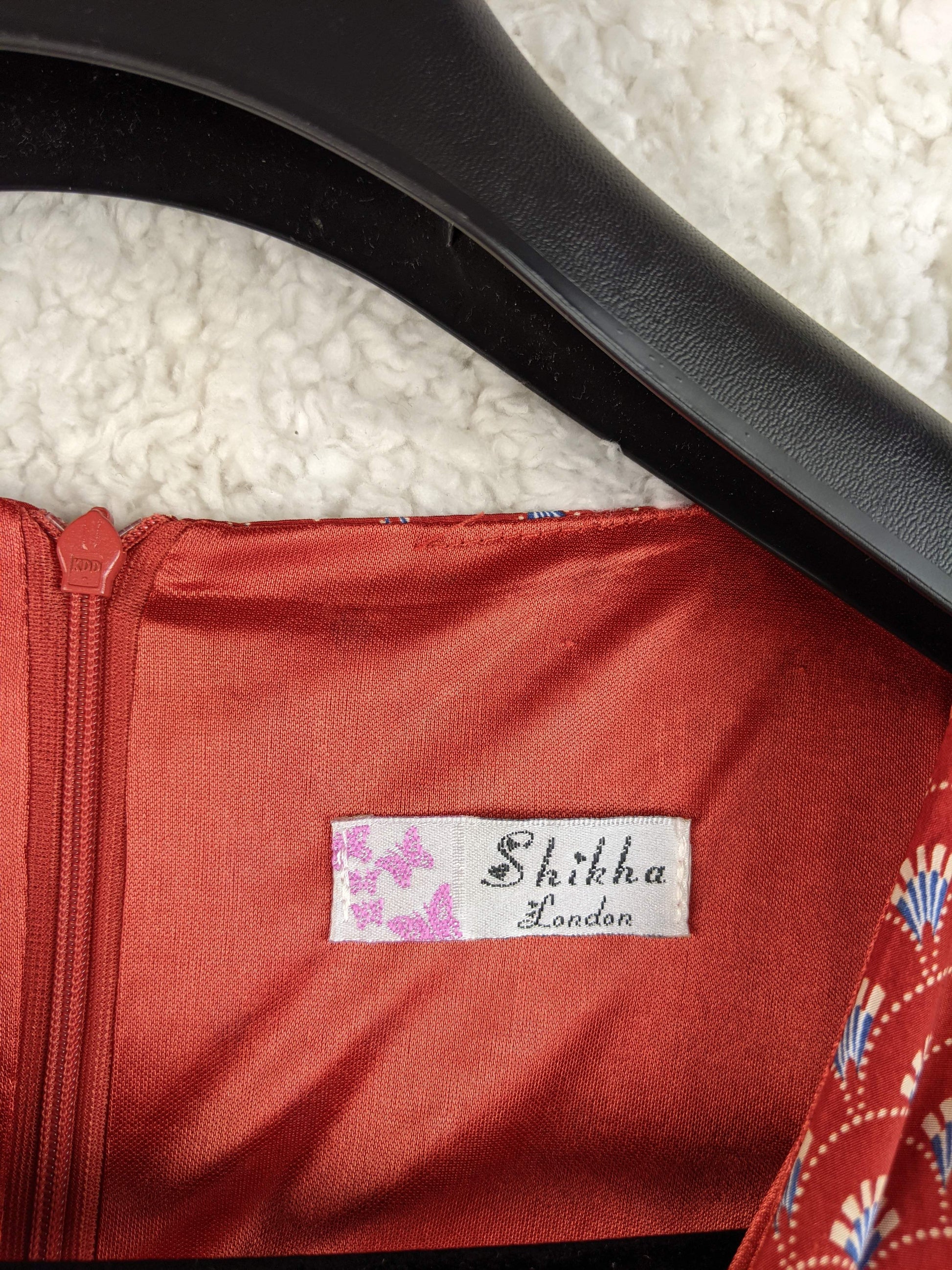 Close-up of Shikha London brand label