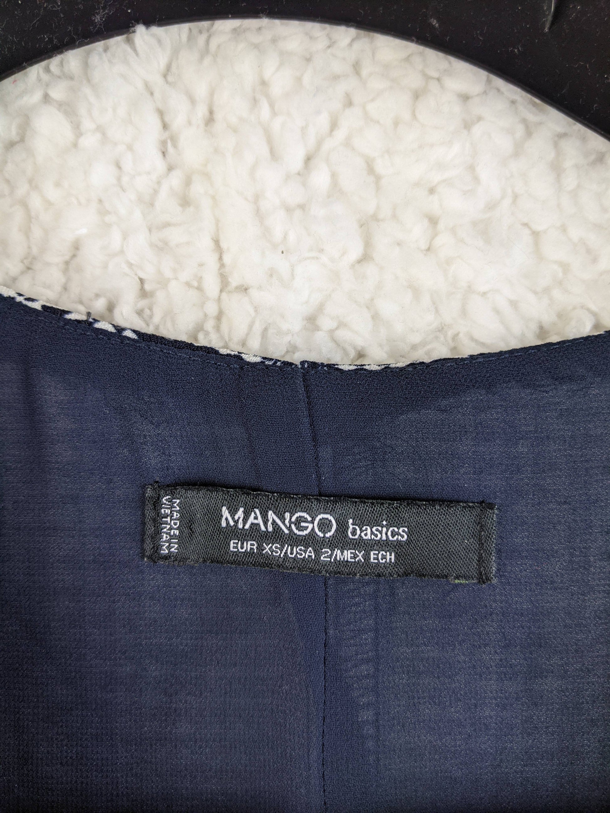 Label showing size and brand of Mango Basics dress