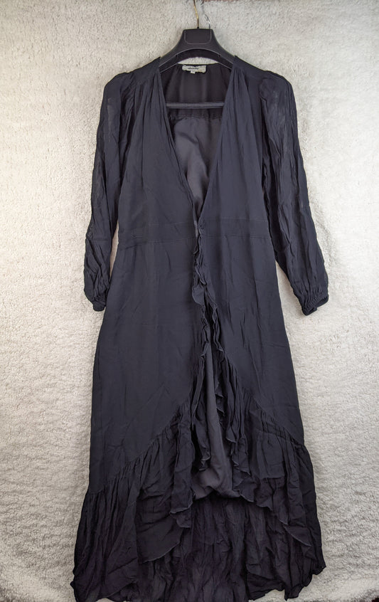 Front view of black ruffled long dress