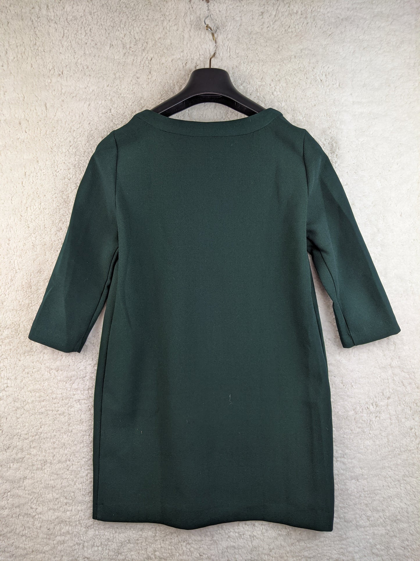Back view of Mango dark green V-neck dress