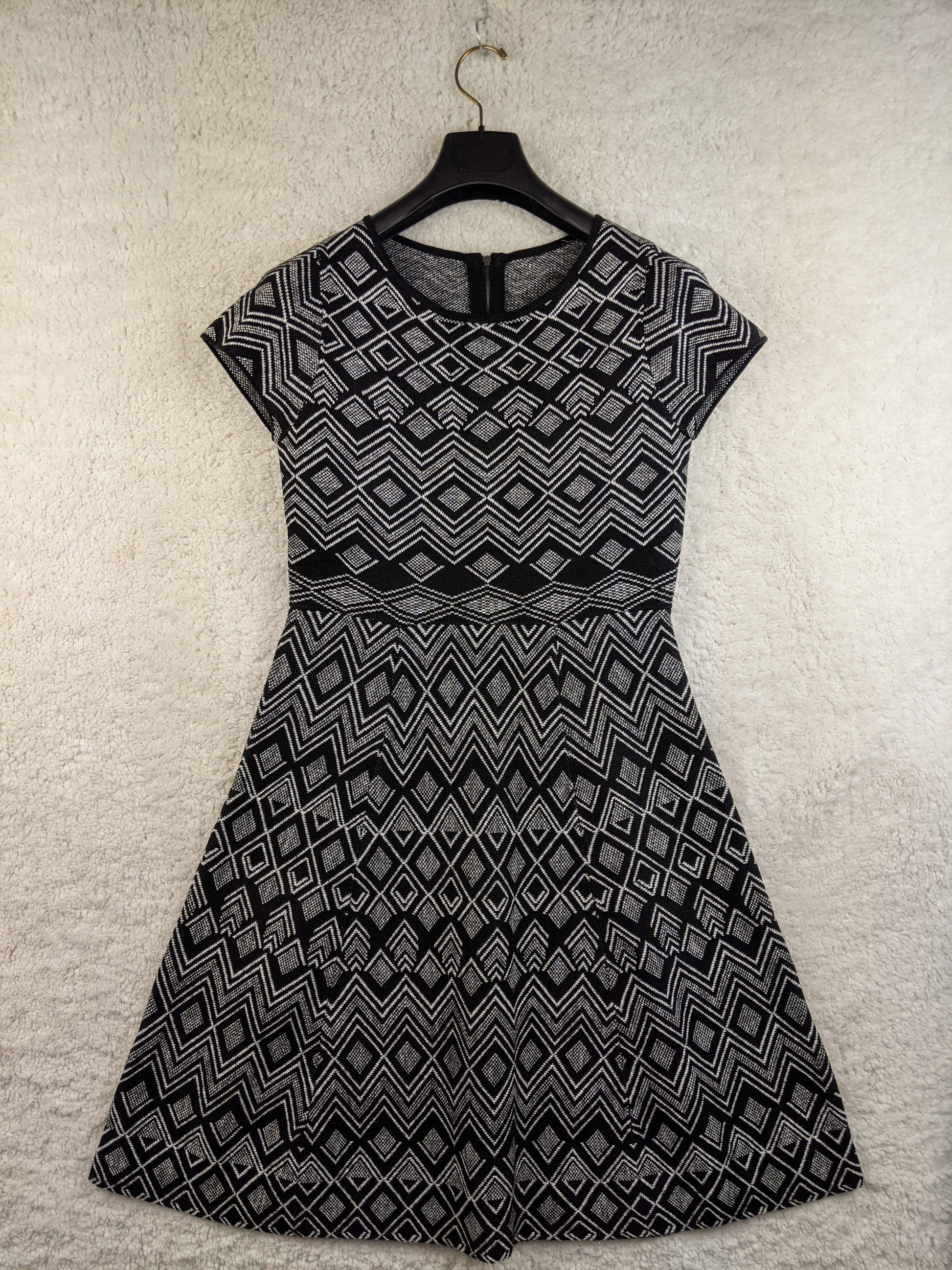 Front of black and white patterned dress