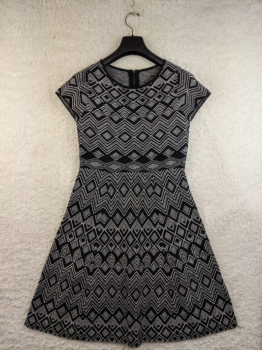 Front of black and white patterned dress