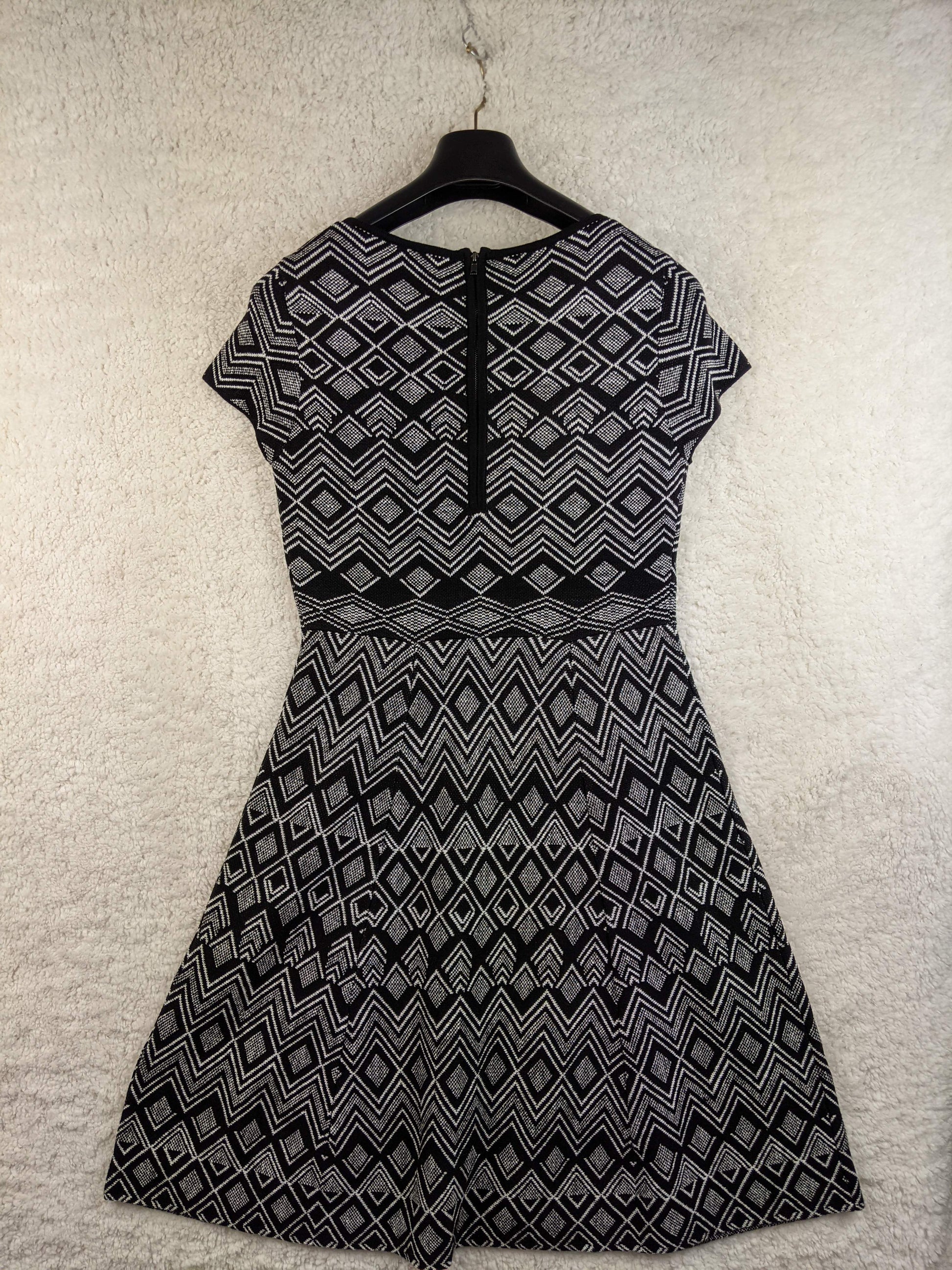 Back of black and white patterned dress