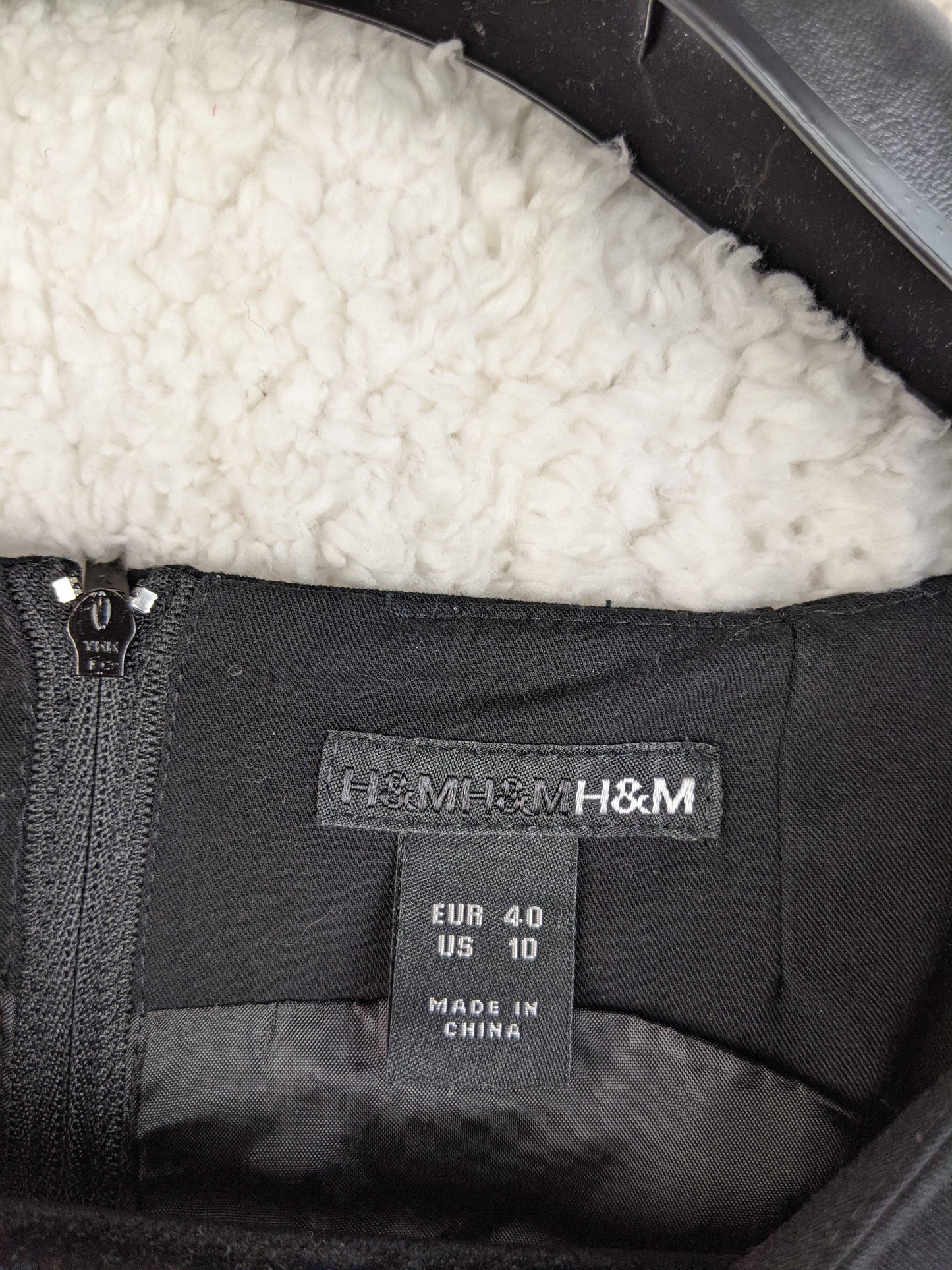 Label on H&M dress showing size and brand