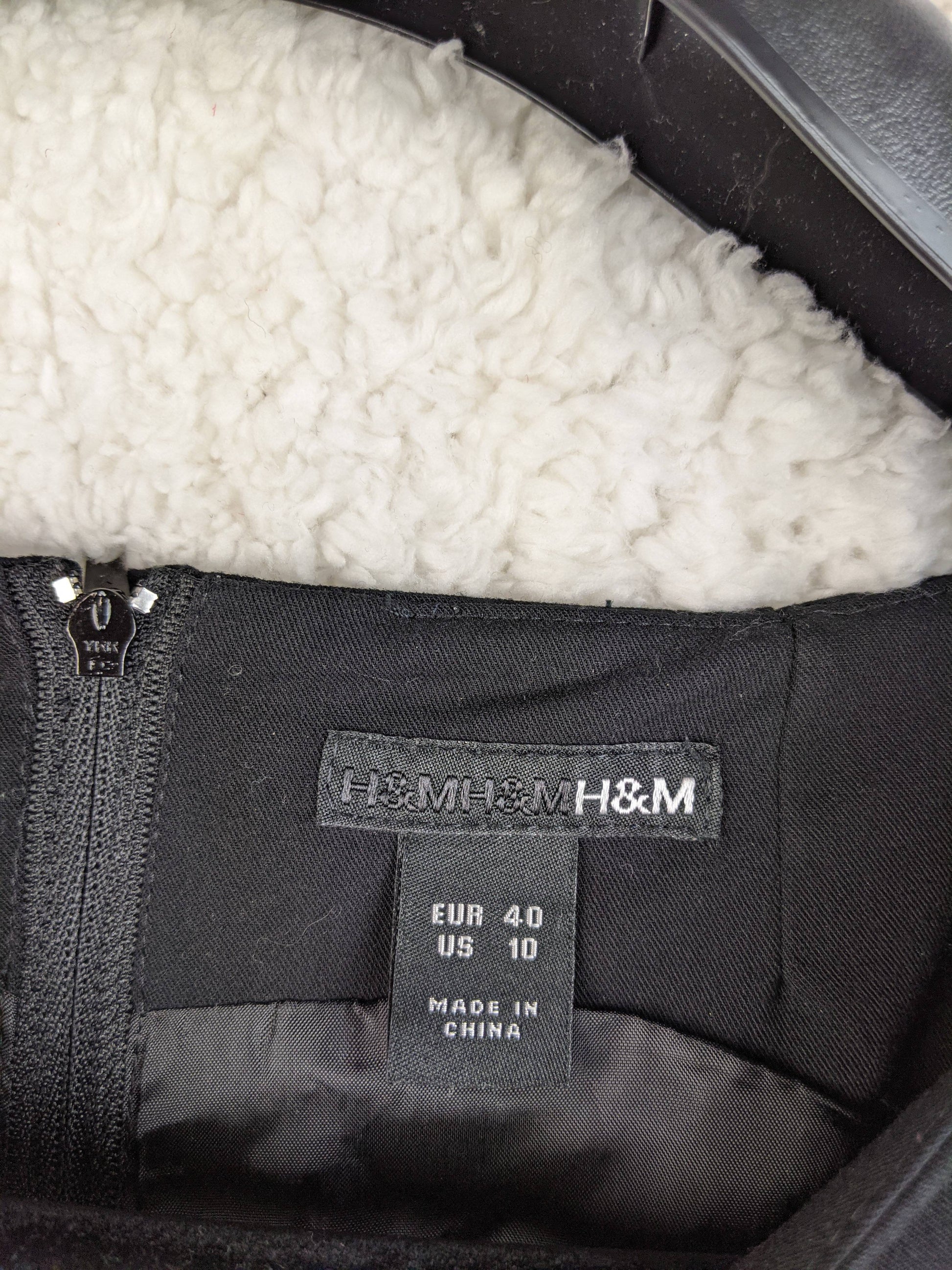 Label on H&M dress showing size and brand