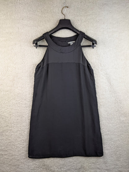 Front view of black sleeveless dress on a hanger