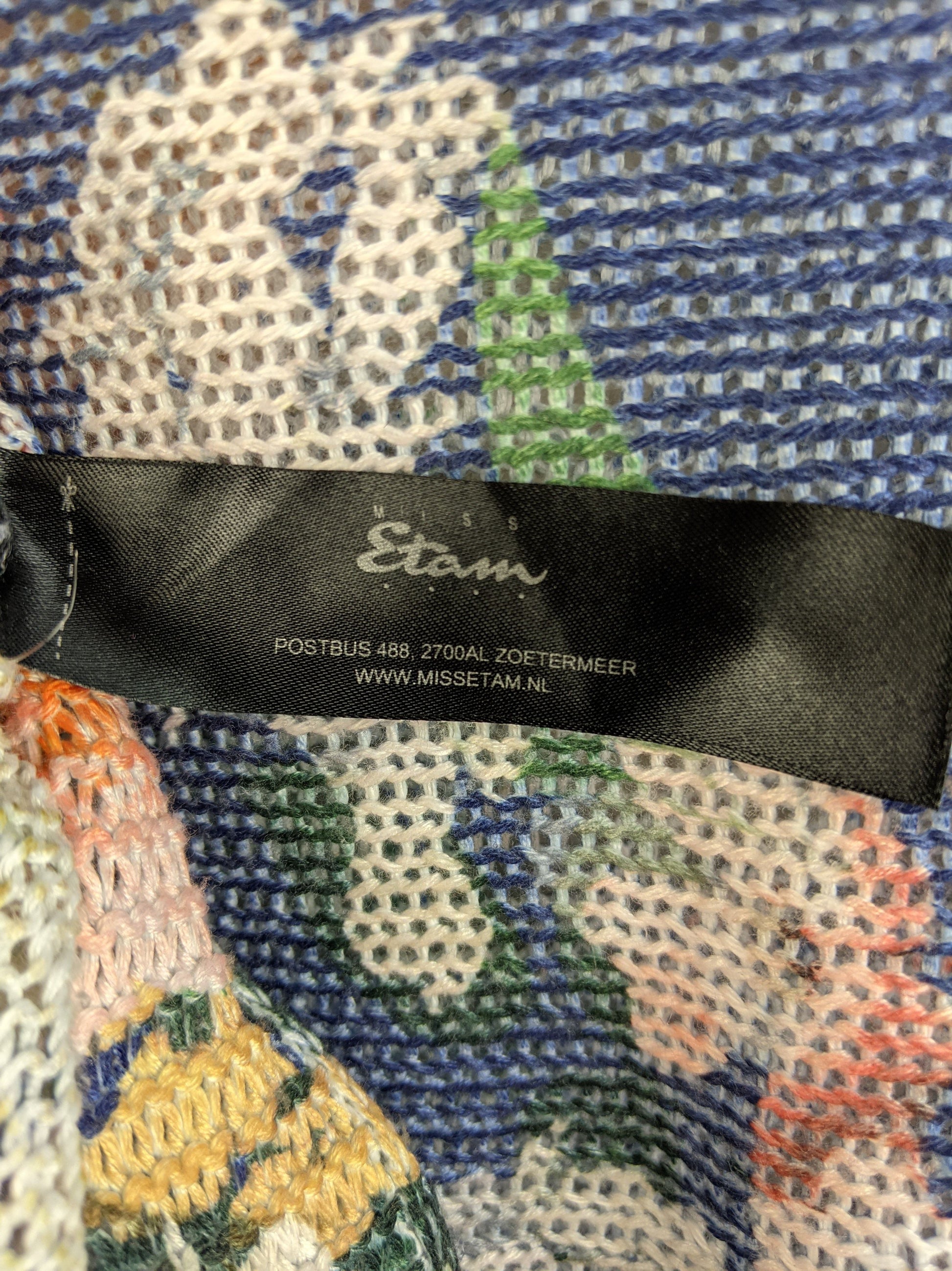 Brand label of Miss Etam floral knit top