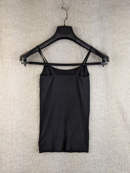 Back view of black spaghetti strap top on hanger