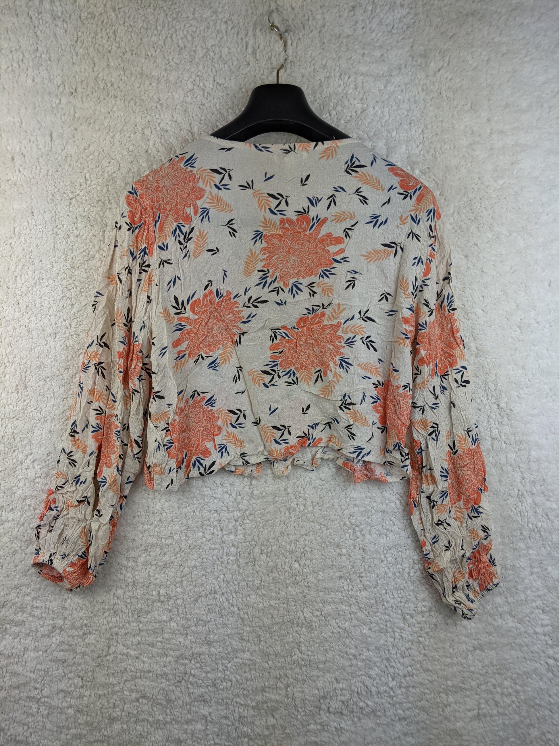 Back view of Amuse Society floral cropped blouse