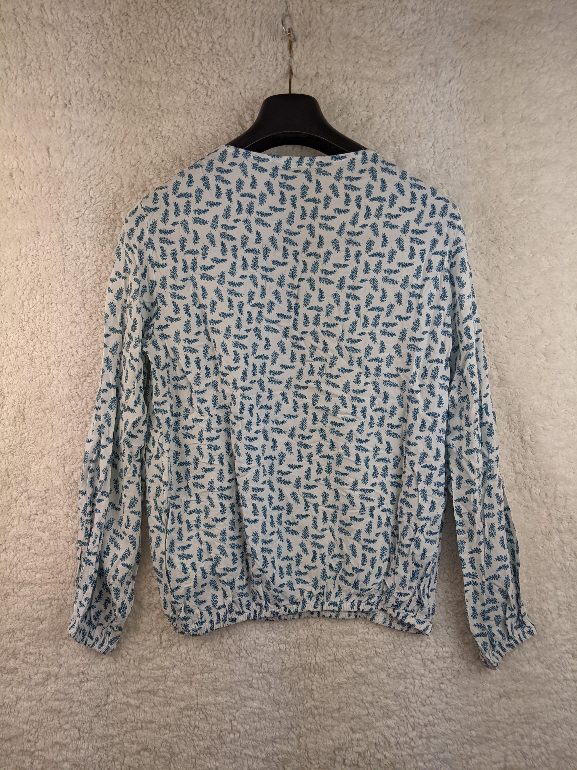 Back view of Geisha blue leaf print blouse