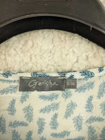 Label of Geisha blouse showing brand and size