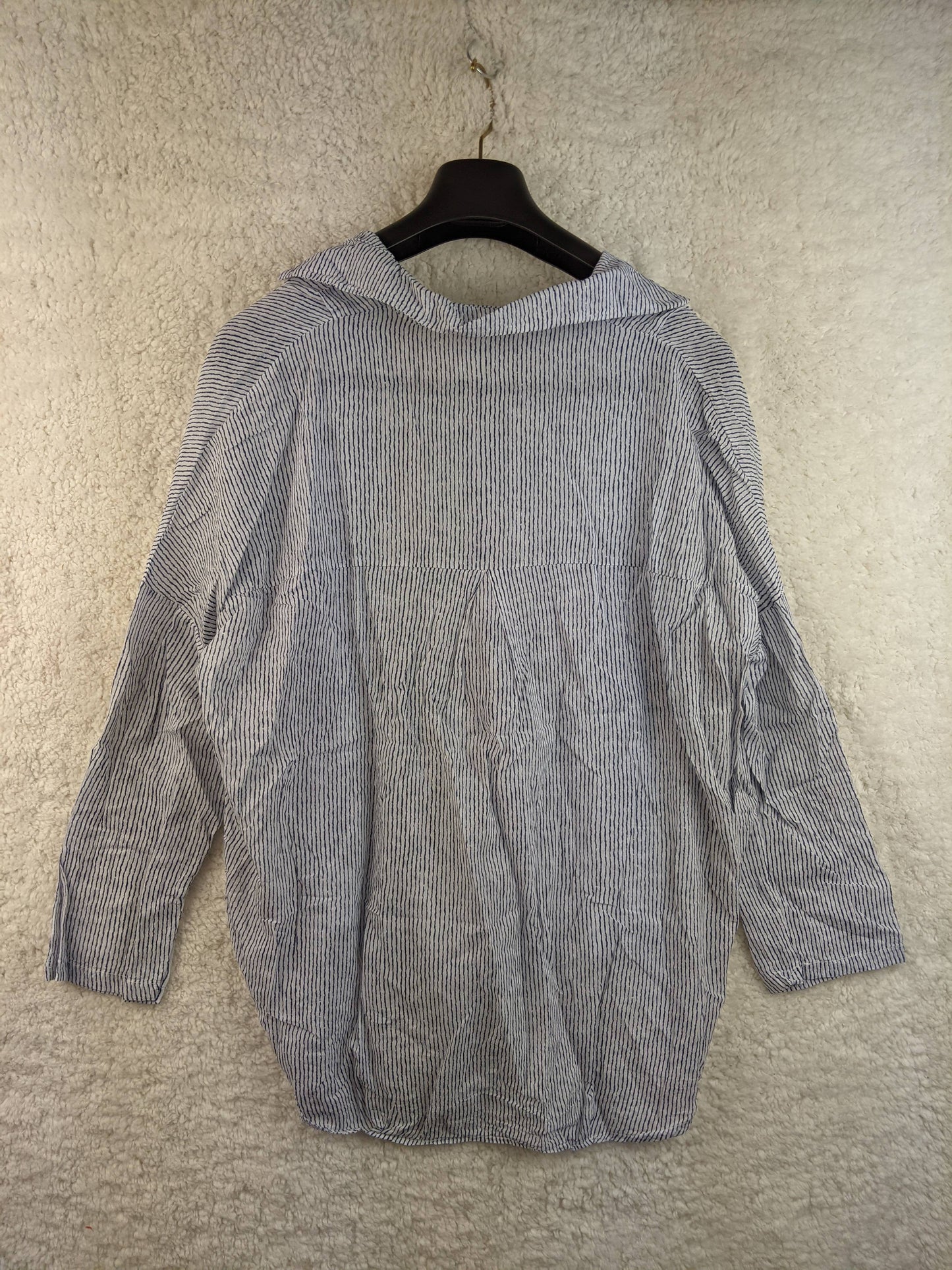 Back view of blue striped blouse