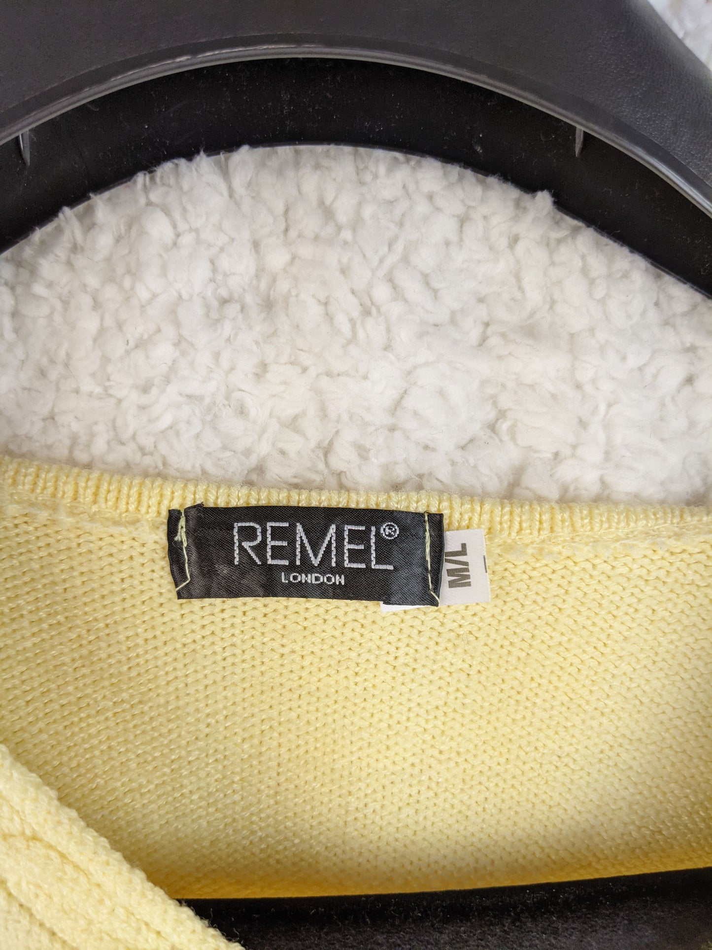 Remel brand label and size tag