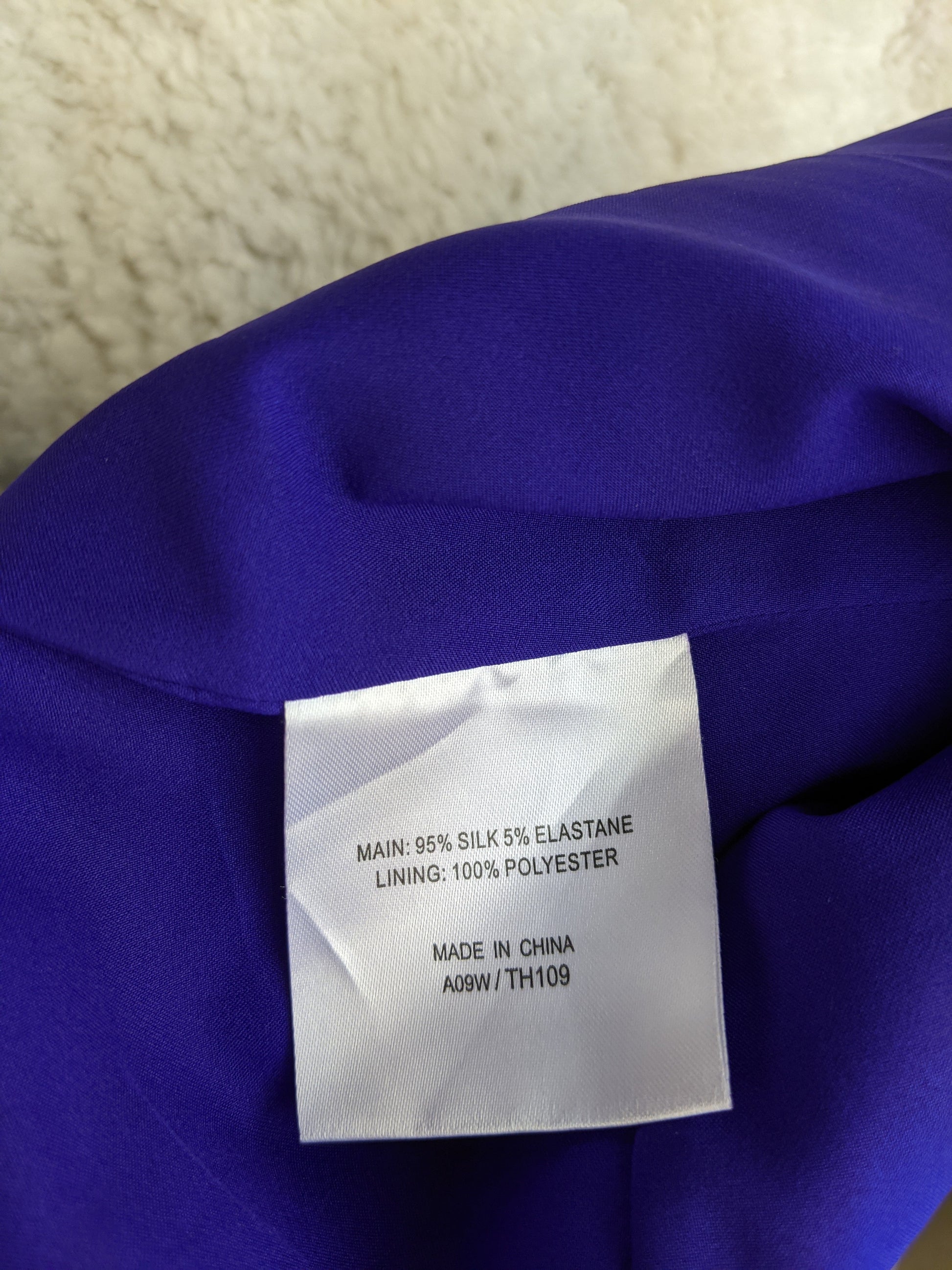 Material tag of Karen Millen blue top