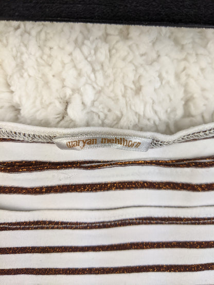 Close-up of the brand label on the tank top