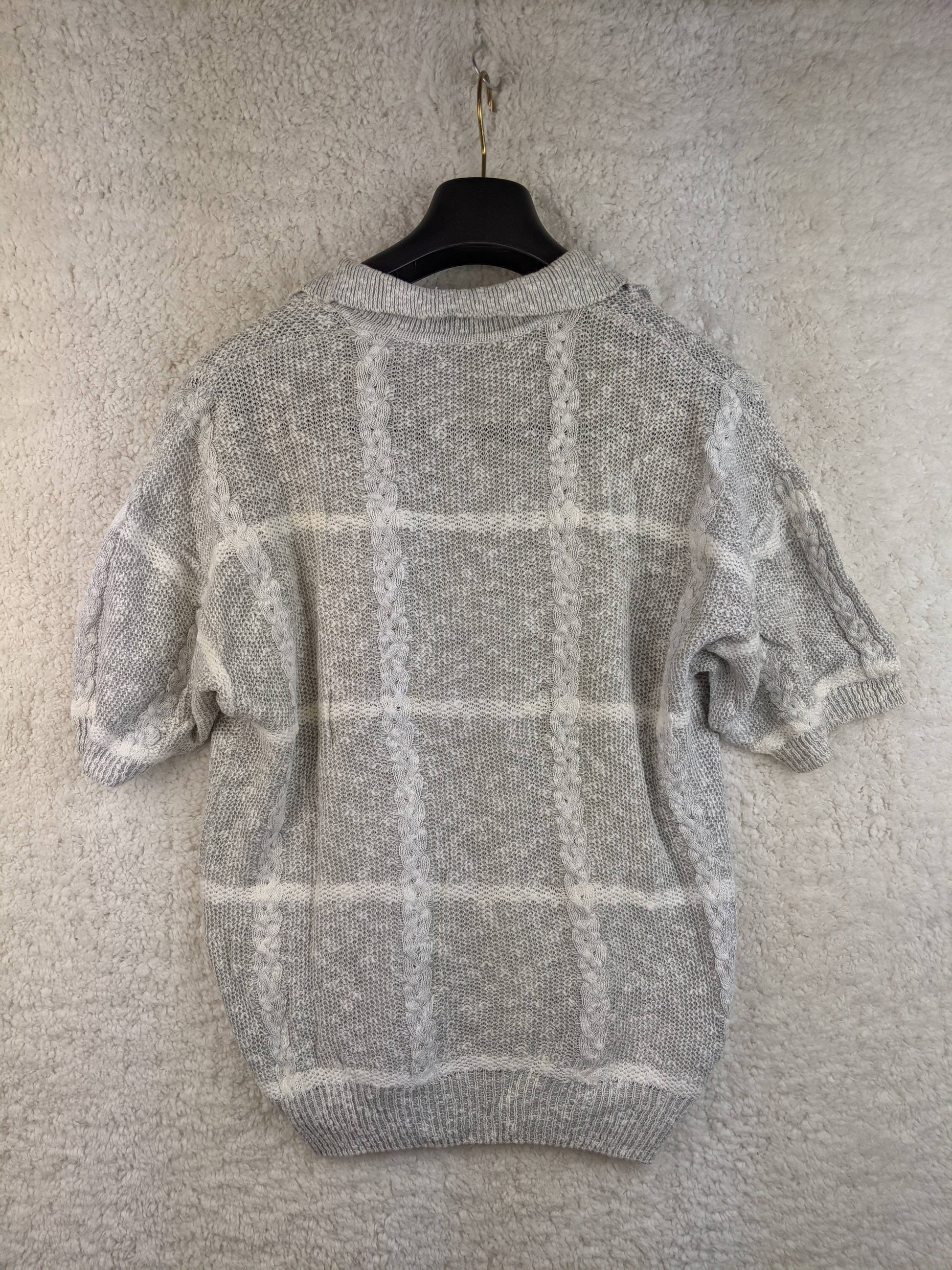 Back view of a vintage gray short-sleeve knit top