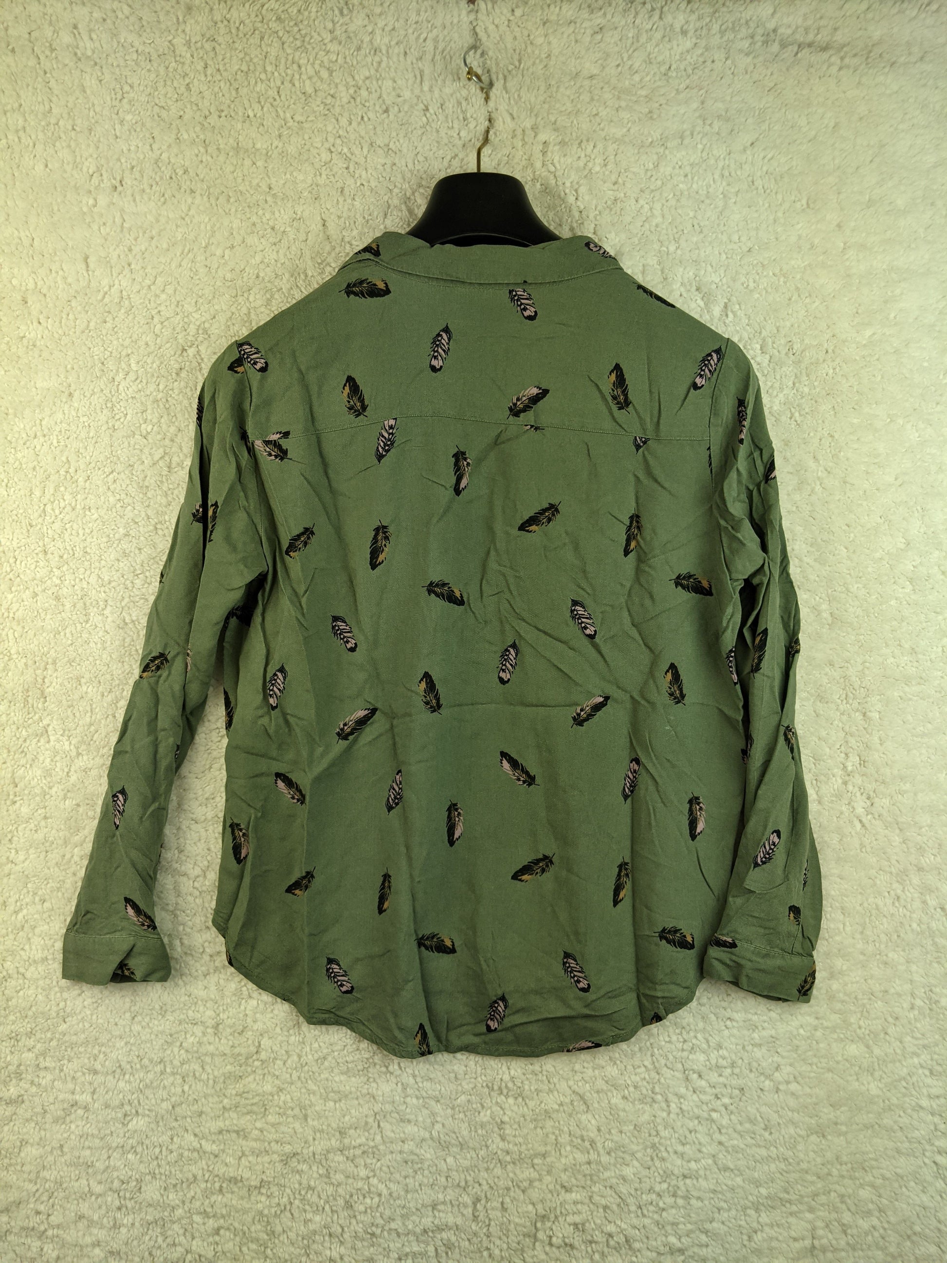 Back view of green feather print shirt