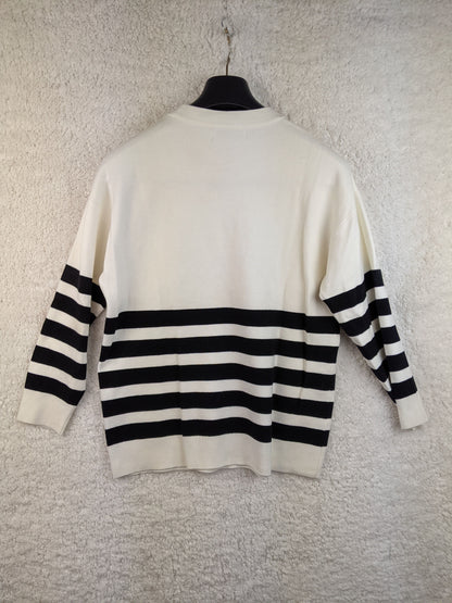 Back view of MNG black and white striped sweater