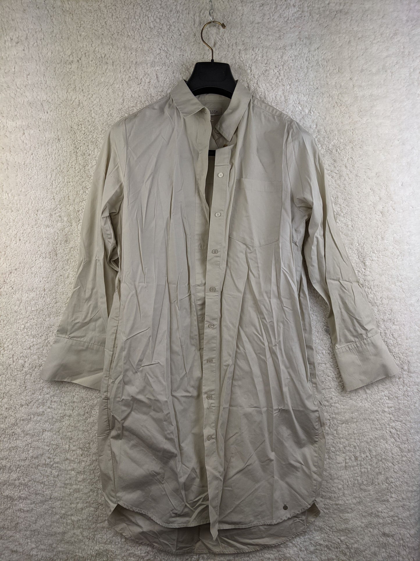 Front view of beige long sleeve shirt dress