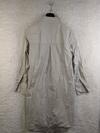 Back view of beige long sleeve shirt dress