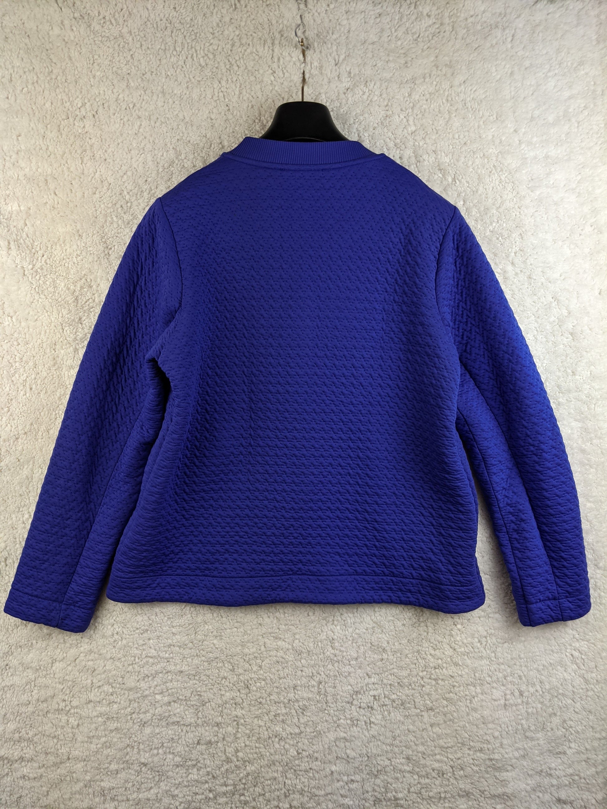 Back view of M&S Collection blue textured jacket
