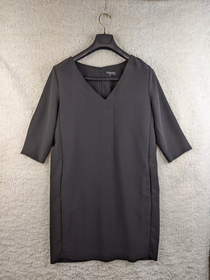 Front view of black dress on hanger