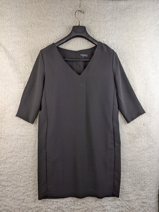 Front view of black dress on hanger
