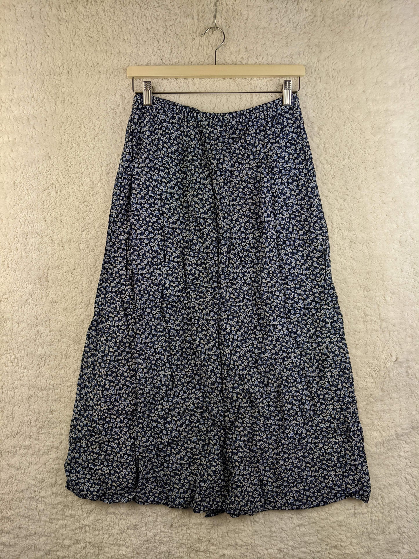 Back view of blue floral midi skirt
