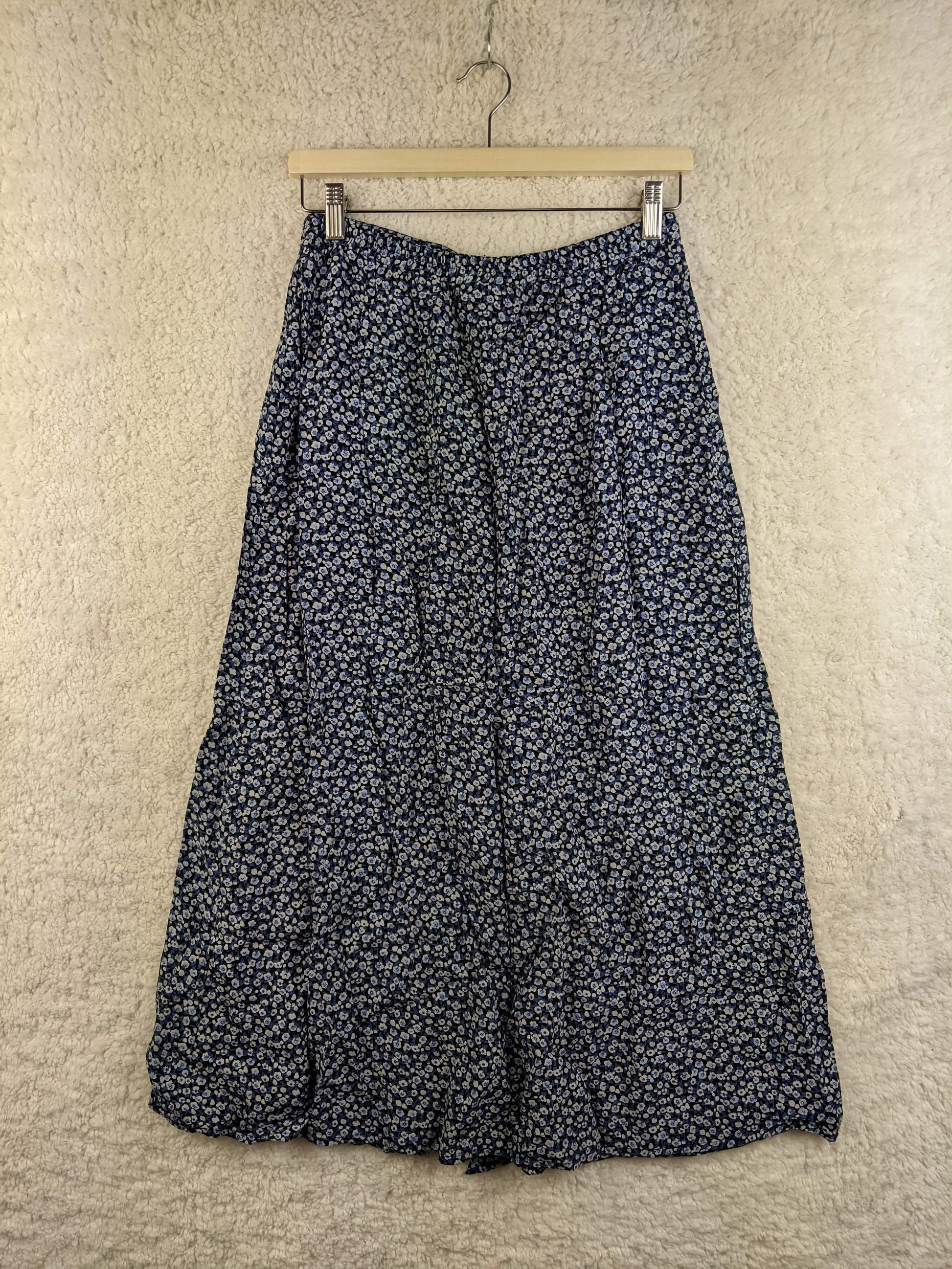 Back view of blue floral midi skirt