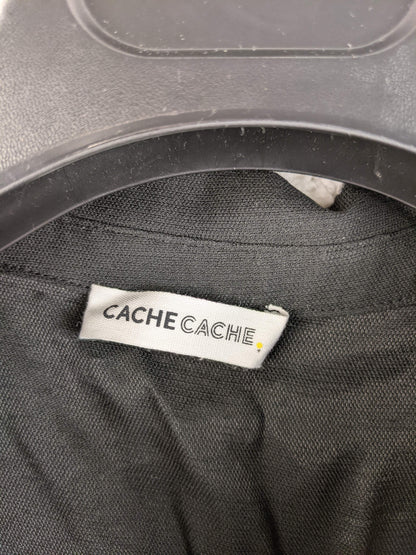 Brand label of Cache Cache on black dress