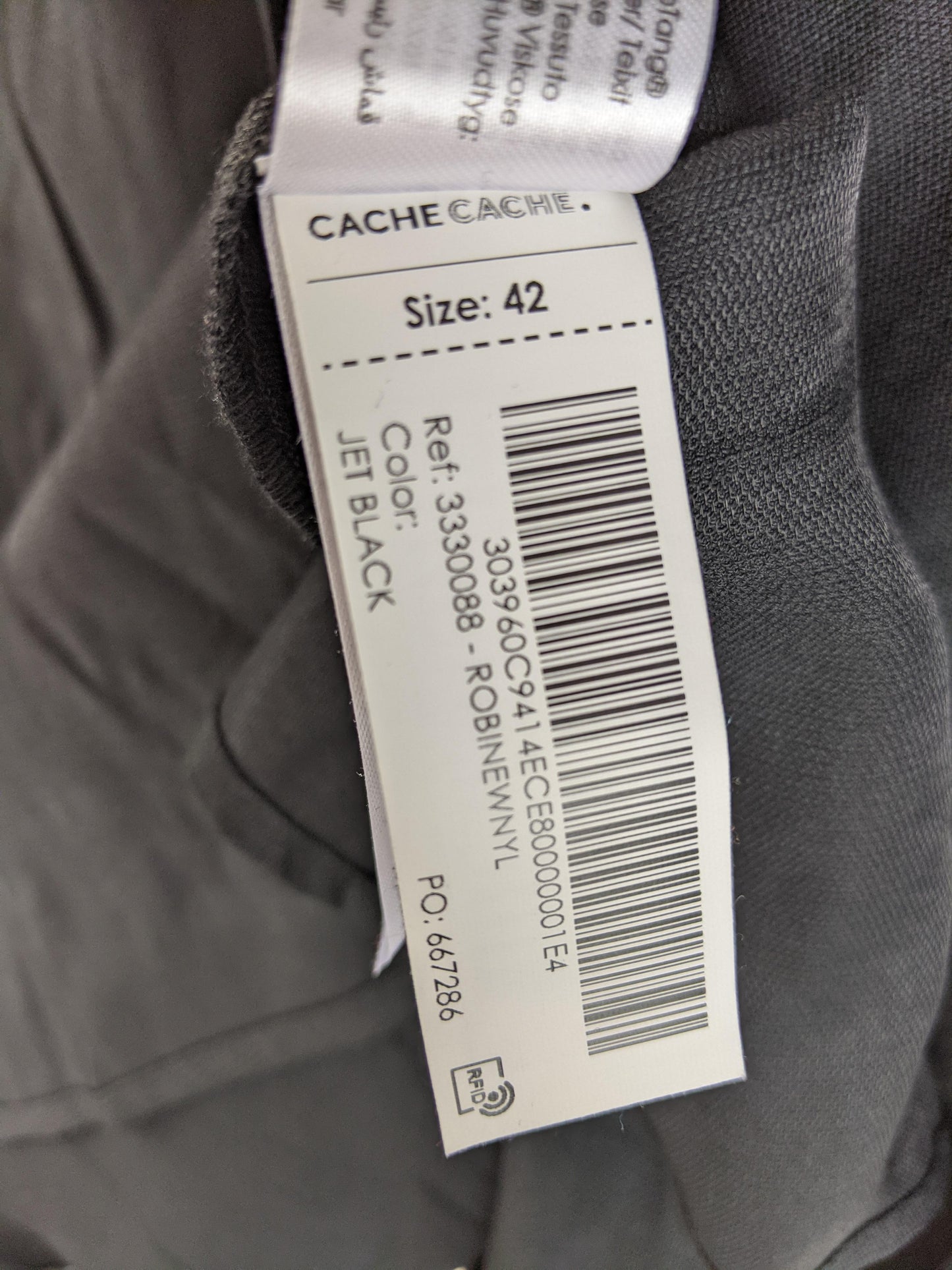 Size label showing size 42 and color Jet Black