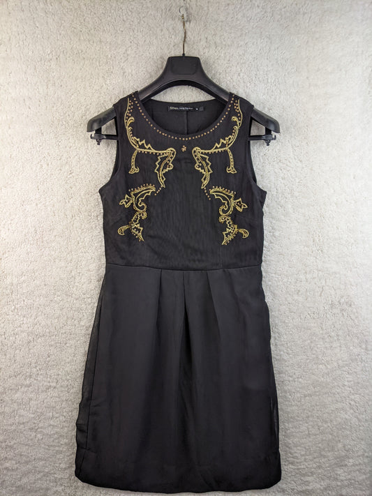 Front view of black embellished dress