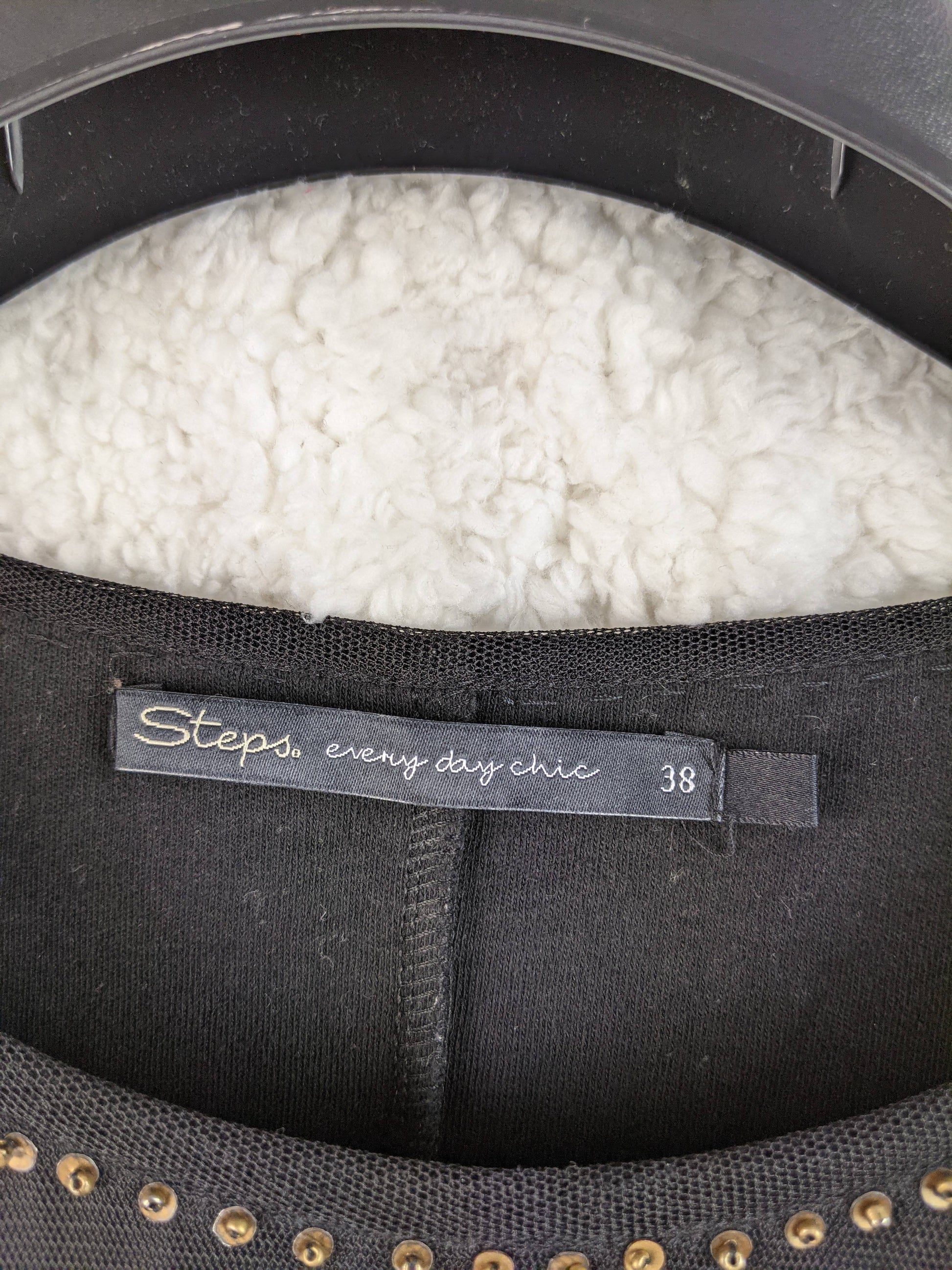 Close-up of Steps brand tag