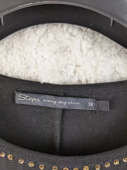 Close-up of Steps brand tag