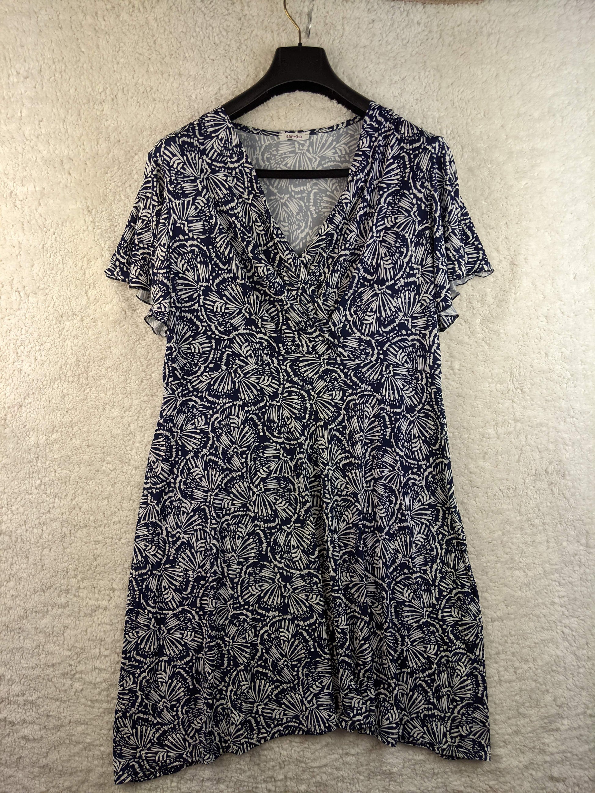Front view of navy and white floral dress