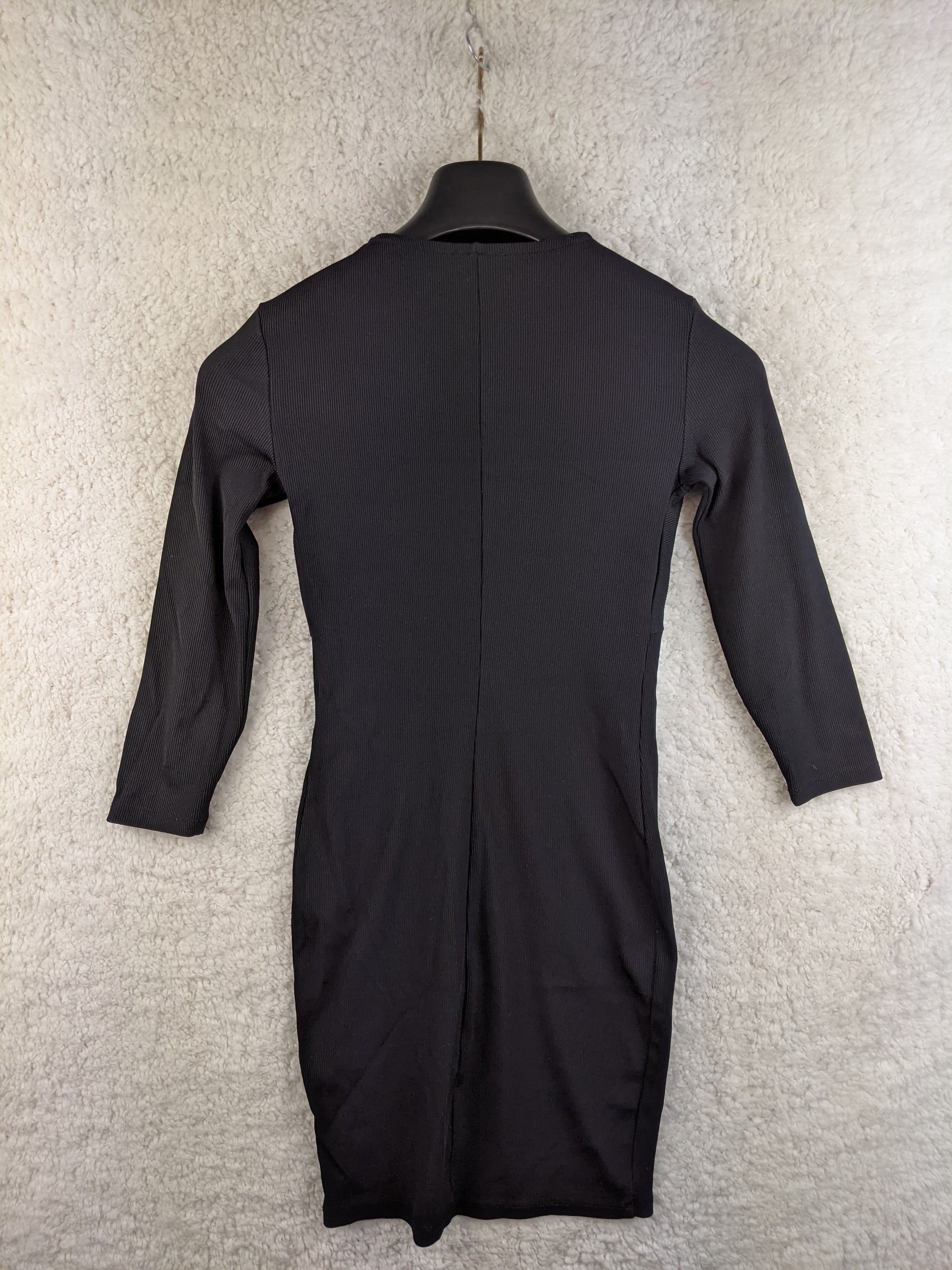Back view of black bodycon dress
