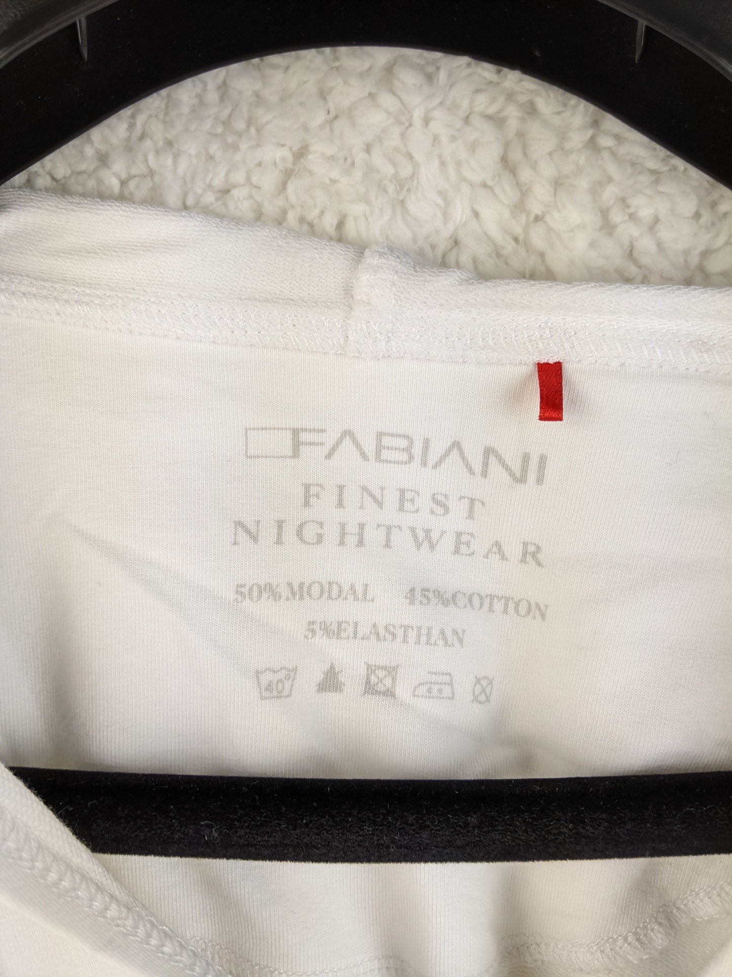 Label of Fabiani nightwear showing material and wash instructions