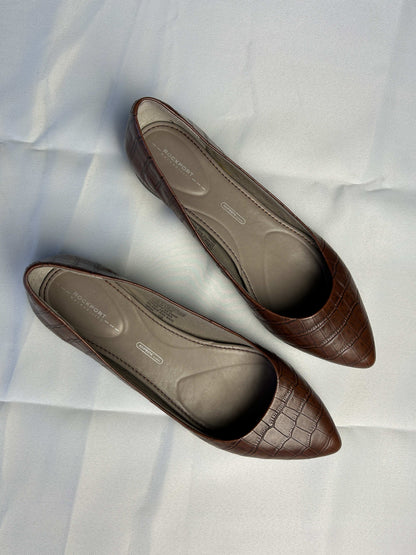 Top view of Rockport brown croc-embossed leather flats