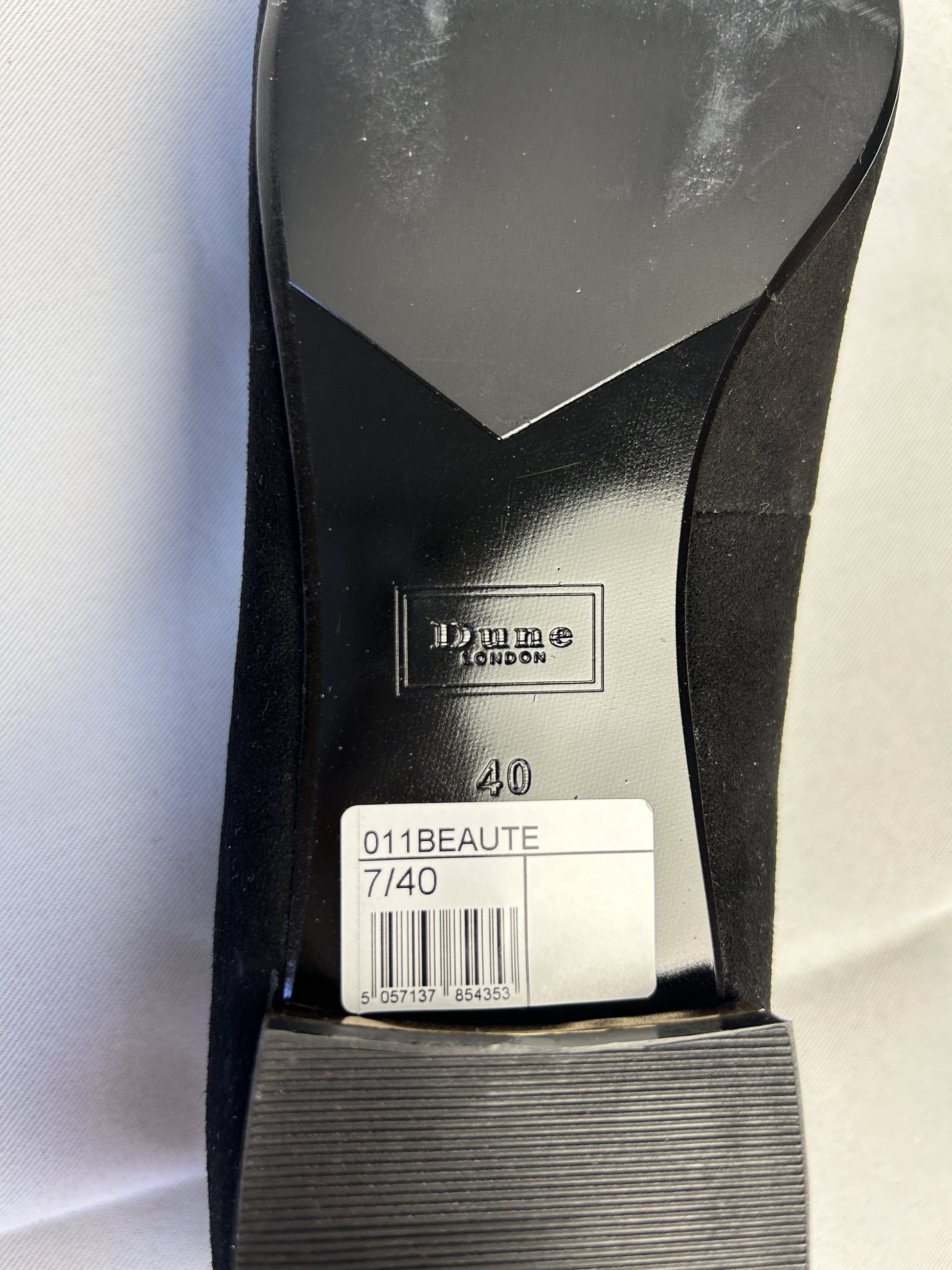 Bottom view showing size and brand of the shoe