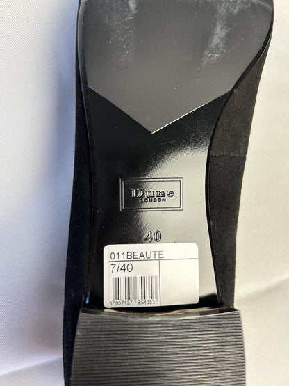 Bottom view showing size and brand of the shoe