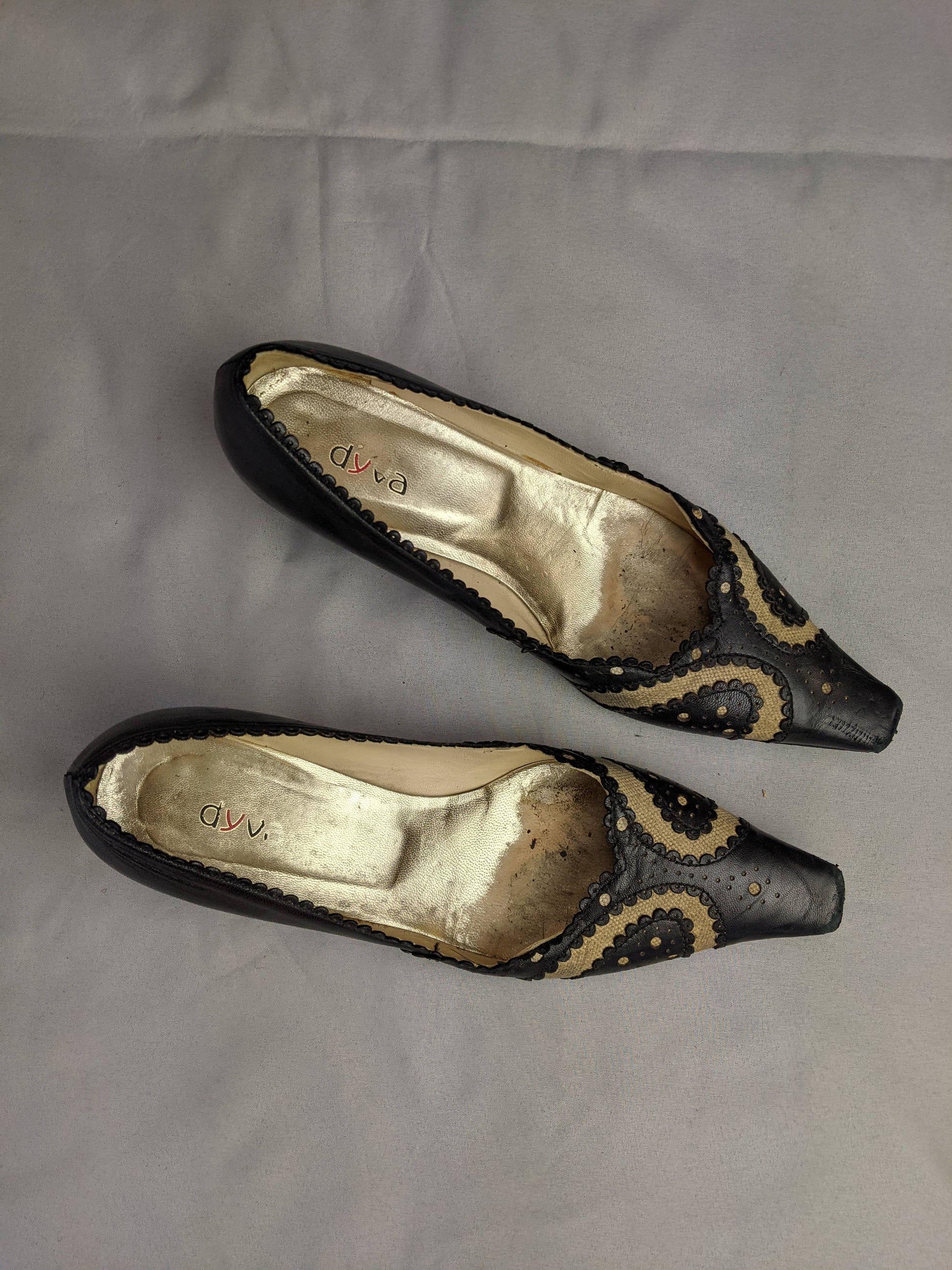 Top view of black leather heels