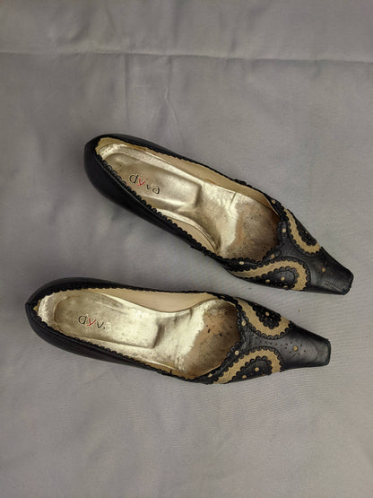 Top view of black leather heels