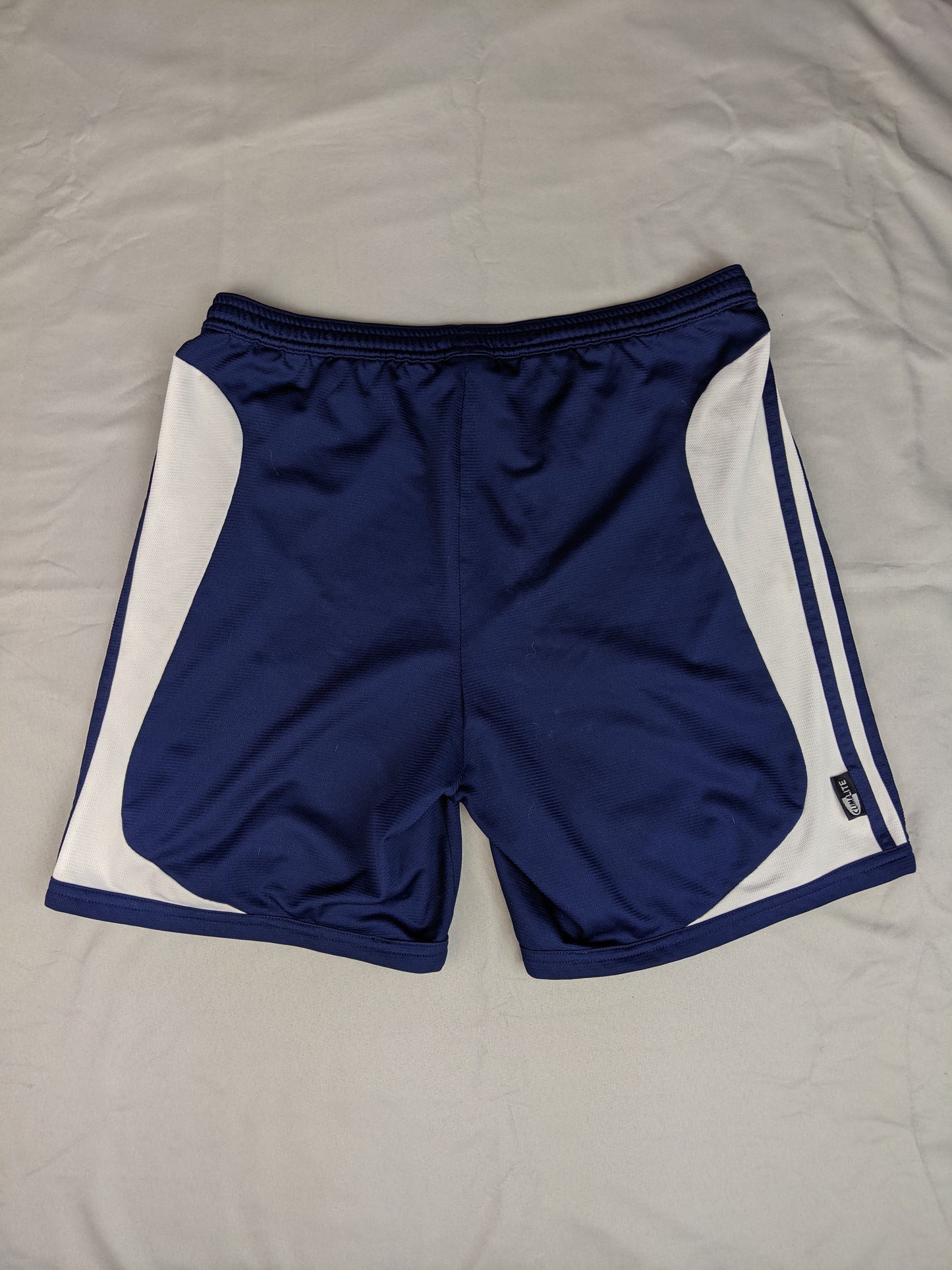 Back view of navy blue Adidas sports shorts