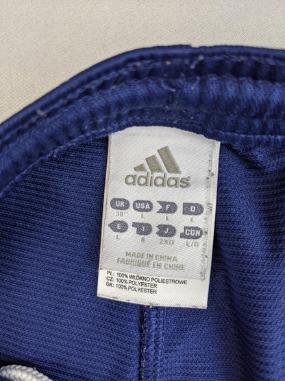 Size label on Adidas navy blue shorts